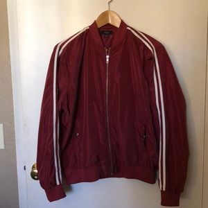 Red athletic windbreaker